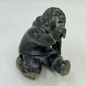 Inuit Hand Carved Blackstone  Drinking Figure Sculpture by NAPATCHIE ASHOONA